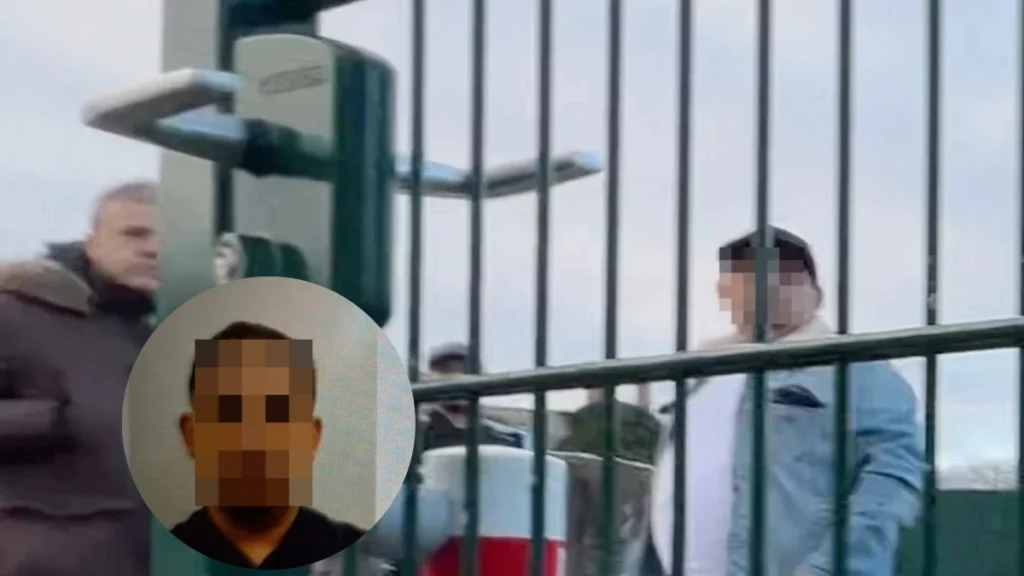 Pikselizirani muškarac iza ograde u kadru televizijskog priloga o slučaju socijalne pomoći u Njemačkoj